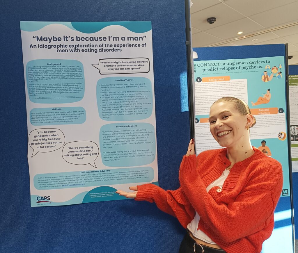 Rachel is pictured with the men and eating disorders poster at the NHS Research Scotland Mental Health Annual Scientific Meeting in November 2024.